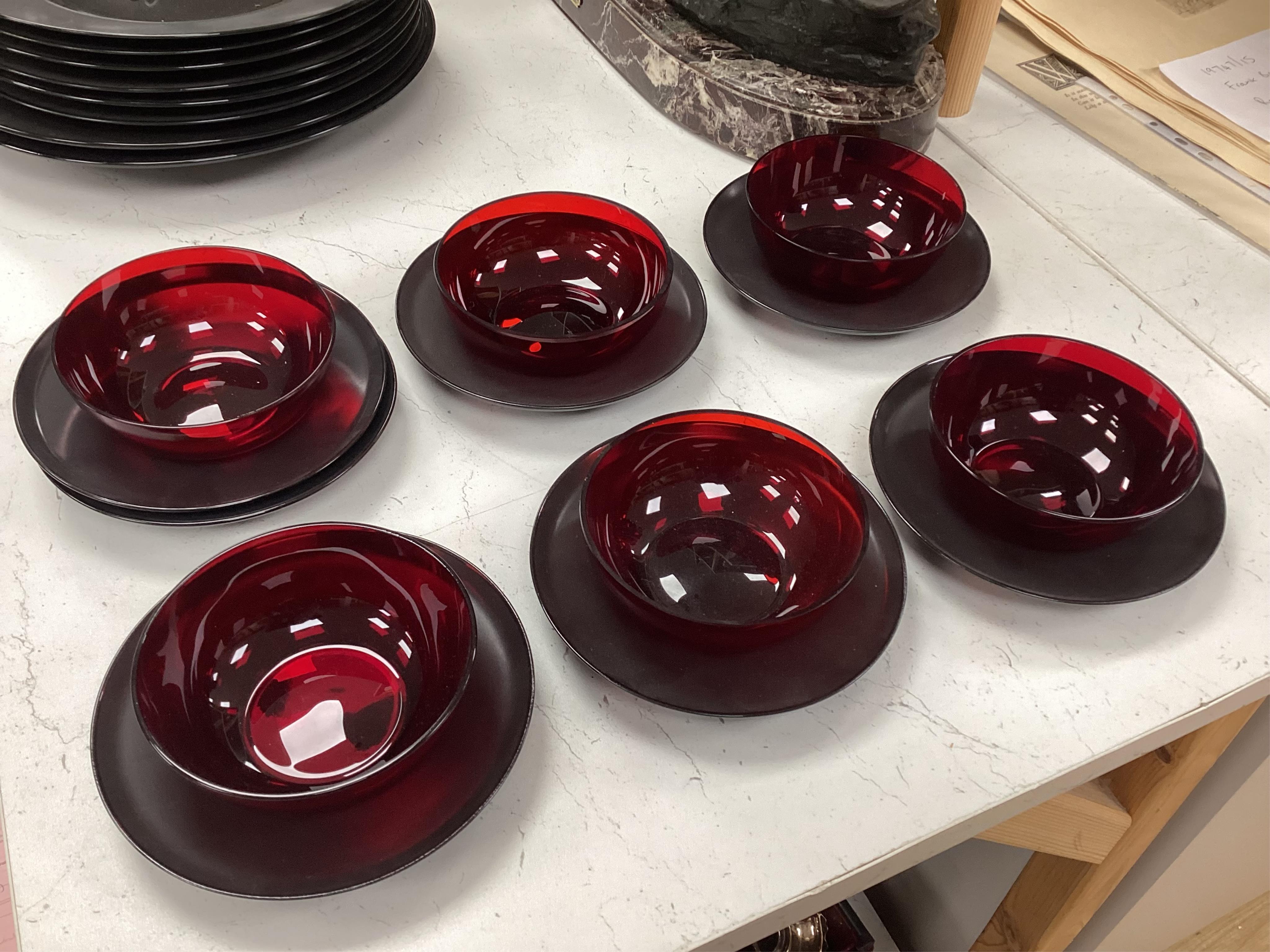 A Wirkkala for Rosenthal part dinner set to include a set of dinner plates, two tureens and six ruby glass bowls, largest 33cm in diameter